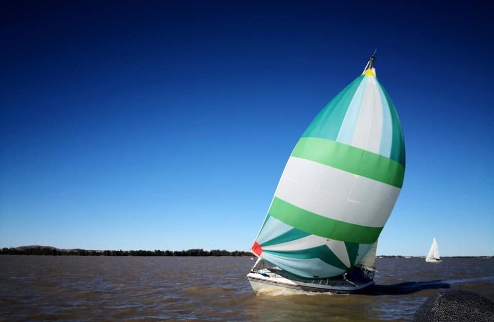 Picture of sailboat with green sails