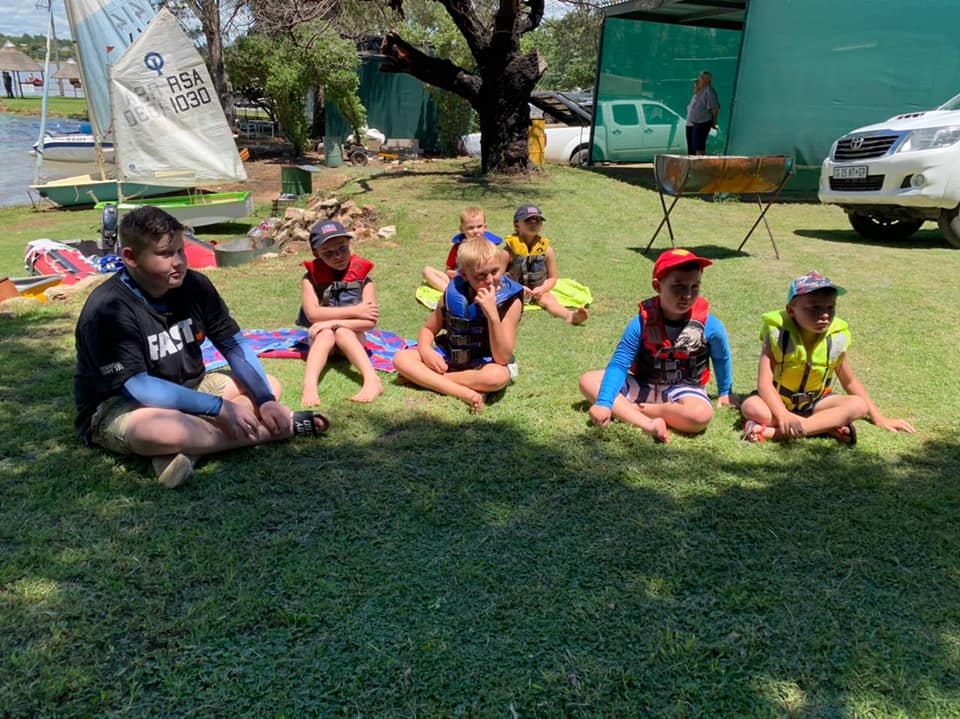 Group of junior sailors listening to a lecture