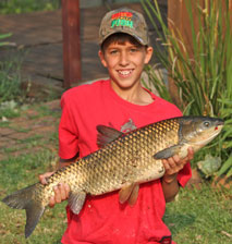 Little boy with a fish